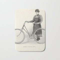 "Leading a Bicycle About" from "Bicycling for Ladies" by Maria E. Ward, 1896 Bath Mat