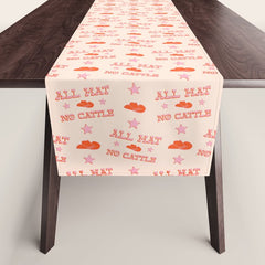 "All hat no cattle" in pink and orange retro western letters Table Runner