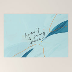 "Here's To Being Free." Welcome Mat