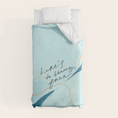 "Here's To Being Free." Duvet Cover