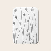 A group of poppy heads Bath Mat