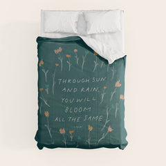 "Through Sun And Rain, You Will Bloom All The Same." Comforter