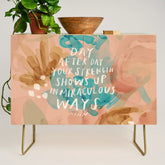 "Day After Day Your Strength Shows Up In Miraculous Ways." Credenza