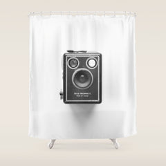 A Kodak Brownie analog vintage camera on a white background Retro photography in black and white Shower Curtain