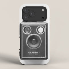 A Kodak Brownie analog vintage camera on a white background Retro photography in black and white iPhone Case