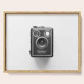 A Kodak Brownie analog vintage camera on a white background Retro photography in black and white Serving Tray