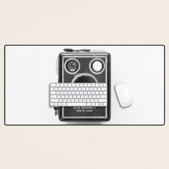 A Kodak Brownie analog vintage camera on a white background Retro photography in black and white Desk Mat