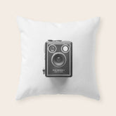 A Kodak Brownie analog vintage camera on a white background Retro photography in black and white Throw Pillow