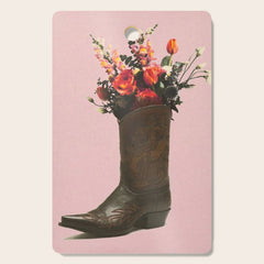 A Cowboy Boot With Spring Bouquet Cutting Board