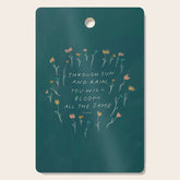 "Through Sun And Rain, You Will Bloom All The Same." Cutting Board
