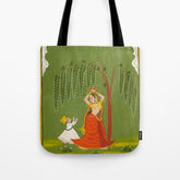 A female attendant is standing in tribhanga pose under a tree. A small child vies for her attention. Tote Bag