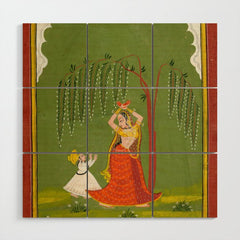 A female attendant is standing in tribhanga pose under a tree. A small child vies for her attention. Wood Wall Art