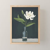 A flower in a vase Mini Art Print