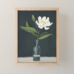 A flower in a vase Mini Art Print