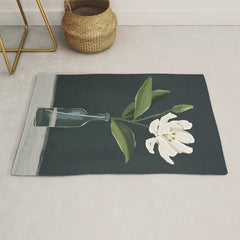 A flower in a vase Rug