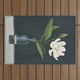A flower in a vase Outdoor Rug