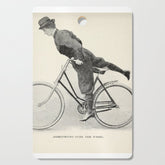 "Dismounting Over the Wheel" from "Bicycling for Ladies" by Maria E. Ward, 1896 Cutting Board