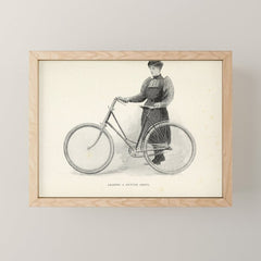 "Leading a Bicycle About" from "Bicycling for Ladies" by Maria E. Ward, 1896 Mini Art Print