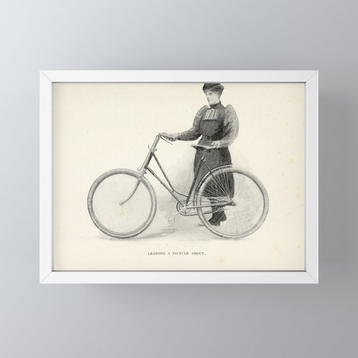 "Leading a Bicycle About" from "Bicycling for Ladies" by Maria E. Ward, 1896 Mini Art Print