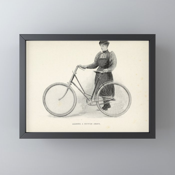 "Leading a Bicycle About" from "Bicycling for Ladies" by Maria E. Ward, 1896 Mini Art Print