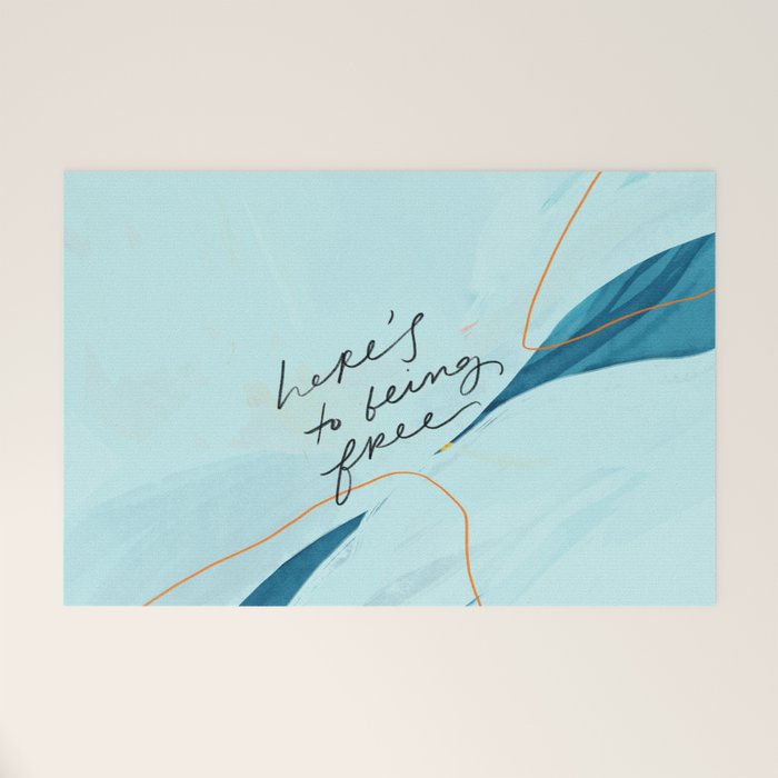 "Here's To Being Free." Welcome Mat