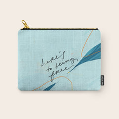 "Here's To Being Free." Carry All Pouch