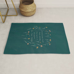 "Through Sun And Rain, You Will Bloom All The Same." Rug