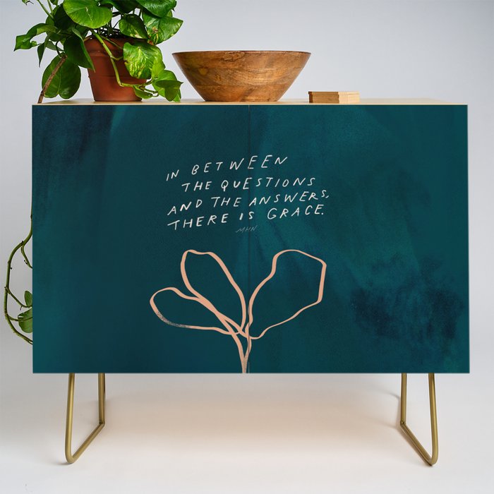 "In Between The Questions And The Answers, There Is Grace." Credenza