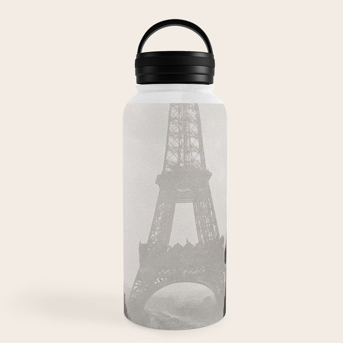 1920 Woman at the Gate, Eiffel Tower black and white photography / jazz age black & white photograph Water Bottle