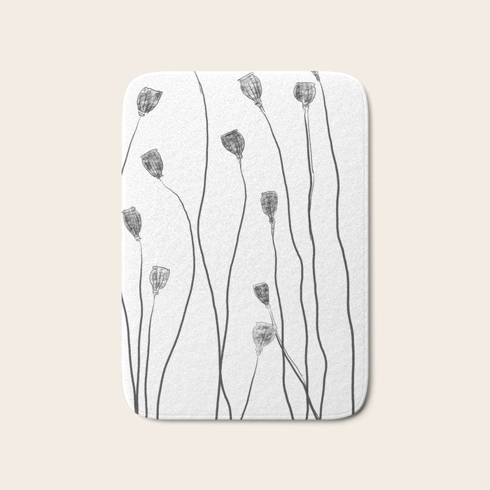 A group of poppy heads Bath Mat