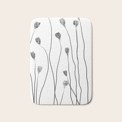 A group of poppy heads Bath Mat