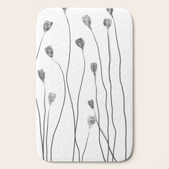 A group of poppy heads Bath Mat