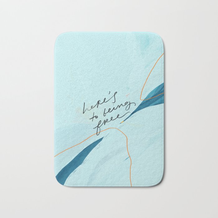 "Here's To Being Free." Bath Mat