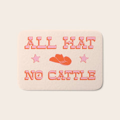 "All hat no cattle" in pink and orange retro western letters Bath Mat