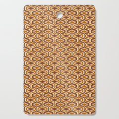 70s mod fabric repeat, orange and browns Cutting Board