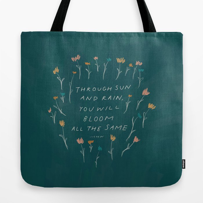 "Through Sun And Rain, You Will Bloom All The Same." Tote Bag