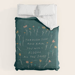 "Through Sun And Rain, You Will Bloom All The Same." Comforter