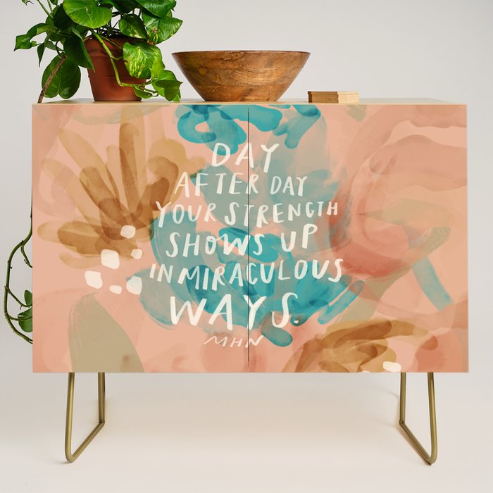 "Day After Day Your Strength Shows Up In Miraculous Ways." Credenza