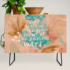 "Day After Day Your Strength Shows Up In Miraculous Ways." Credenza