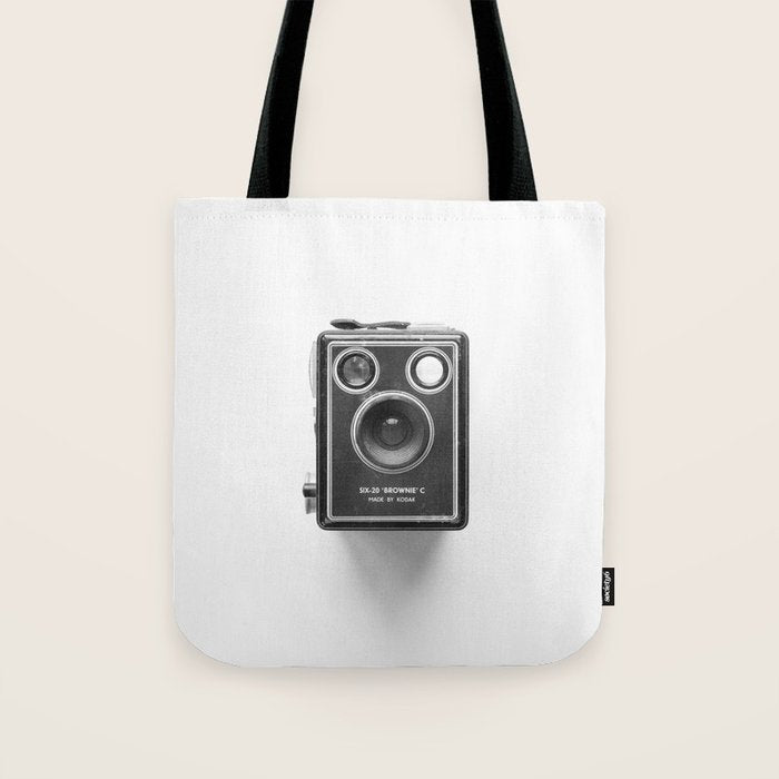 A Kodak Brownie analog vintage camera on a white background  Retro photography in black and white Tote Bag