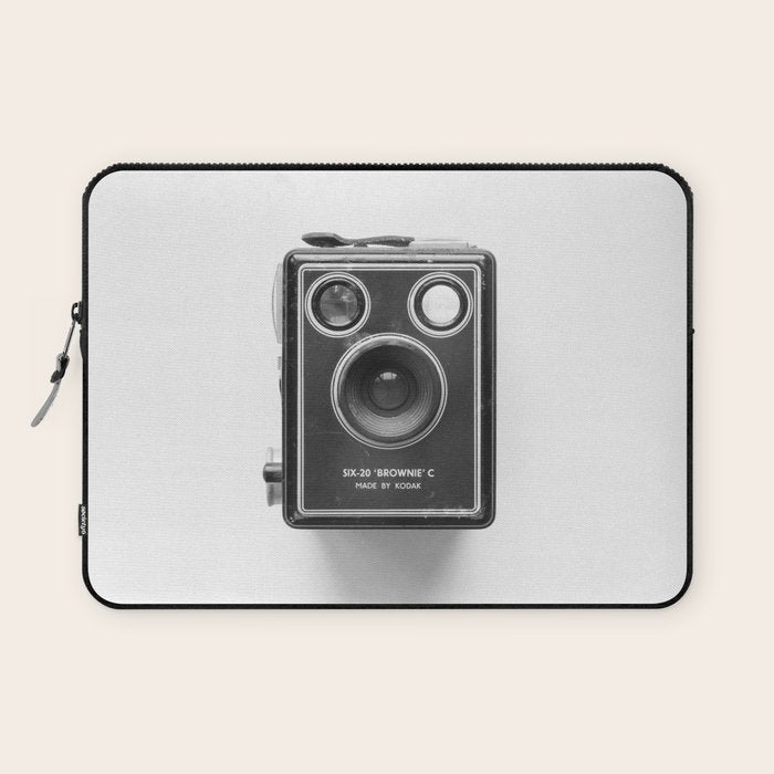 A Kodak Brownie analog vintage camera on a white background  Retro photography in black and white Laptop Sleeve