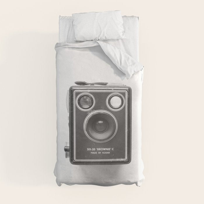 A Kodak Brownie analog vintage camera on a white background  Retro photography in black and white Duvet Cover