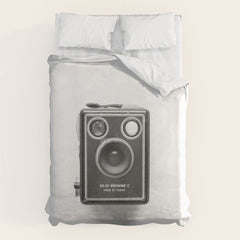 A Kodak Brownie analog vintage camera on a white background  Retro photography in black and white Duvet Cover