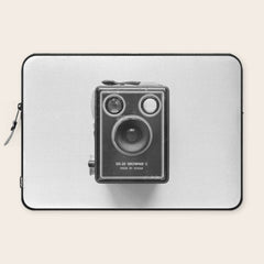 A Kodak Brownie analog vintage camera on a white background  Retro photography in black and white Laptop Sleeve