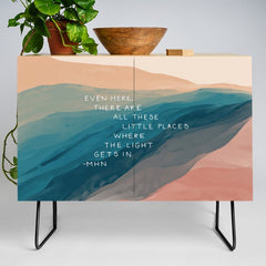 "Even Here, There Are All These Little Places Where The Light Gets In." Credenza