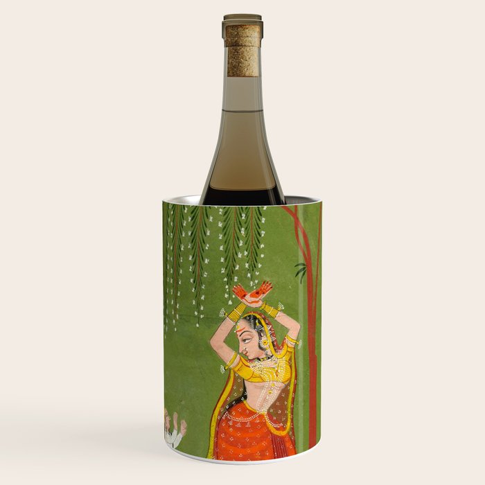 A female attendant is standing in tribhanga pose under a tree. A small child vies for her attention. Wine Chiller