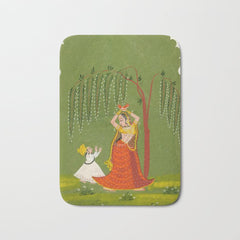 A female attendant is standing in tribhanga pose under a tree. A small child vies for her attention. Bath Mat