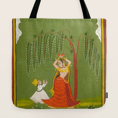 A female attendant is standing in tribhanga pose under a tree. A small child vies for her attention. Tote Bag