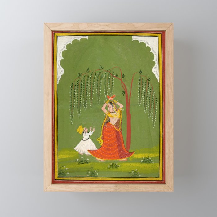 A female attendant is standing in tribhanga pose under a tree. A small child vies for her attention. Mini Art Print