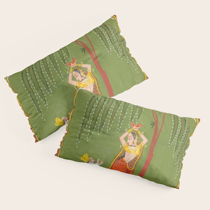 A female attendant is standing in tribhanga pose under a tree. A small child vies for her attention. Pillow Sham